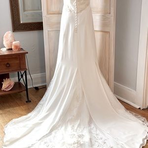 Gorgeous beaded strapless silk wedding dress.